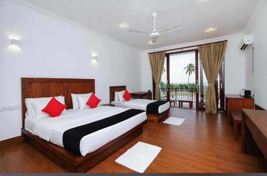 Resort room with multiple beds – kitesurfing accommodation in Kalpitiya